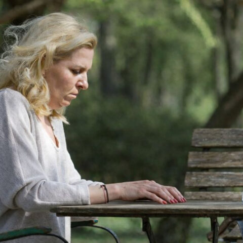 Woman at picnic table